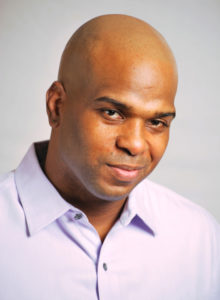 headshot of an aspiring actor in dc with a smirk