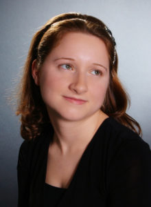 portrait of a white lady with dark blouse