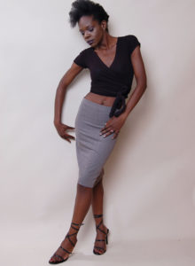 picture of a black model with blouse and skirt