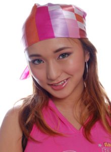 headshot of a teen asian model with head scarf