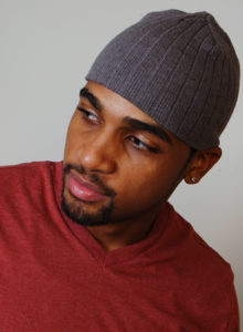 headshot of a black male model in washington dc with a slanted pose