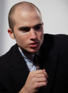 headshot of a male model in dc in a suit and tie