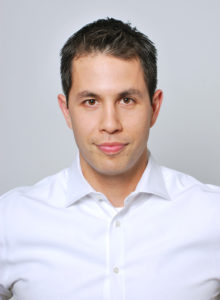 executive headshot of a a young professional in washington dc wearing a black shirt