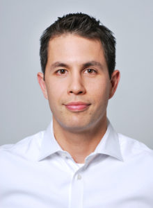business casual headshot of a government executive in washington dc wearing a white shirt