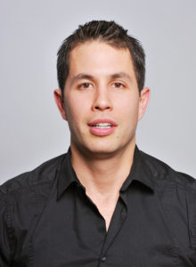 executive headshot of a a young senate staffer in washington dc wearing a black shirt