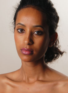 headshot of an ethiopian model with natural beauty