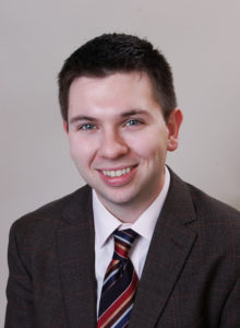 business headshot of a law student in washington dc smiling