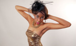 picture of an african model with strapless dress and coif