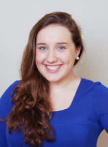 headshot of a young aspiring female actor with a cheerful smile