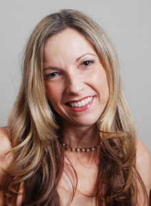 professional headshot of a female freelance author for writer's bio