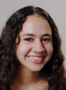headshot of a teen actress with a beautiful smile